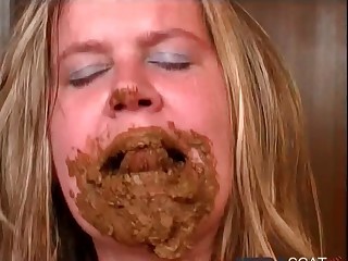 Busty amateur woman eats her crap